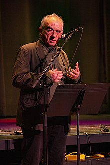 Arthur Milner speaking at an event in 2022.