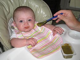 Baby eating baby food.jpg