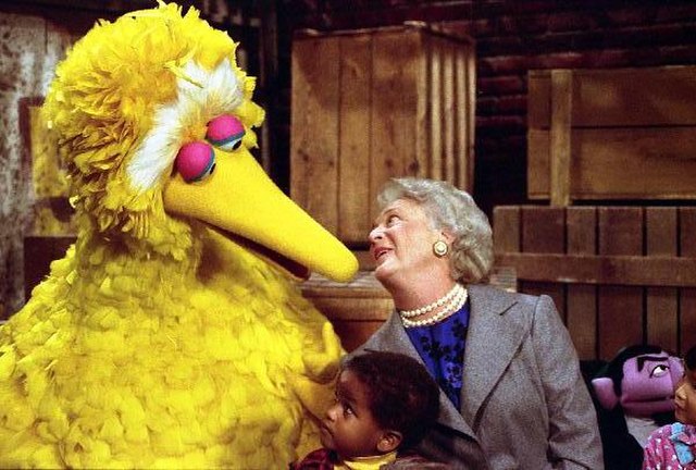First Lady Barbara Bush participates with Big Bird in an educational taping of Sesame Street at United Studios, 1989.