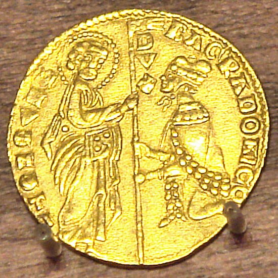 Gold coin of Bartolomeo Gradenigo (1260–1342): the Doge kneeling before St. Mark.