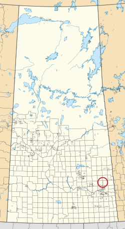 Peta provinsi Saskatchewan menampilkan 297 kota pedesaan dan ratusan kecil India cadangan. Salah satu yang disorot dengan lingkaran merah.