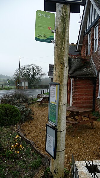 File:Calbourne Sun Inn bus stop in February 2011.JPG