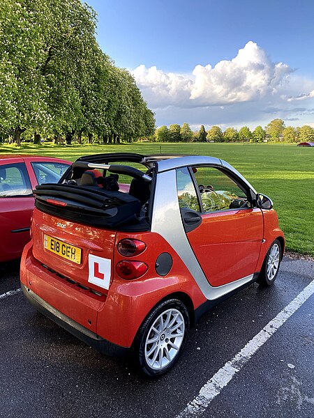 File:Compact Learner Car Parked in UK Park.jpg