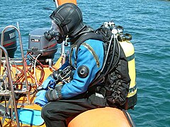 Diver wearing a wing buoyancy compensator