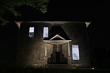 Diana Shpungin's "Drawing Of A House (Triptych)" shown at night Drawing Of A House 2.jpg