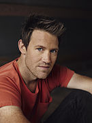 Eddie Perfect plays Mick Holland Eddie Perfect.jpg