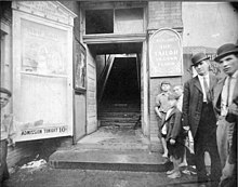 Entrance and stairway to the Canonsburg Opera House as photographed on the morning after the stampede. Entrance to the Canonsburg Opera House.jpg