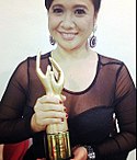 Eugene Domingo accepting Best Actress Award, 2012.jpg