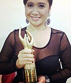 Eugene Domingo accepting Best Actress Award, 2012.jpg