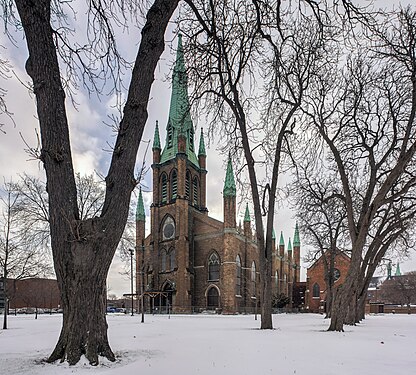 The skies open behind Our Lady of the Assumption Church, Windsor, Ontario