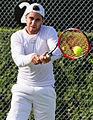 Facundo Arguello competing in the first round of the 2015 Wimbledon Qualifying Tournament at the Bank of England Sports Grounds in Roehampton, England. The winners of three rounds of competition qualify for the main draw of Wimbledon the following week.