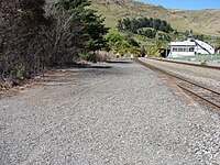 Looking along the Heathcote station platform in the direction of the Lyttelton rail tunnel.