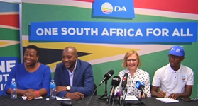 Maimane announcing Zille as the new federal council chair on 20 October 2019. He resigned three days later on 23 October Helen Zille and DA leaders at press conference (October 2019).png