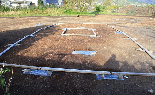 The dig out with postholes of the assumed Viking age Hof at Ose in Ørsta, Norway