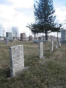 Some of the graves in the burial ground pre-date the 1874 Friends meeting house. Holder Il Bentown9.JPG