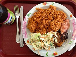 Jollof rice with coleslaw and barbecue chicken