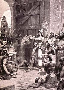 Salmanassar I abocant la pols d'una ciutat conquerida en un temple assiri