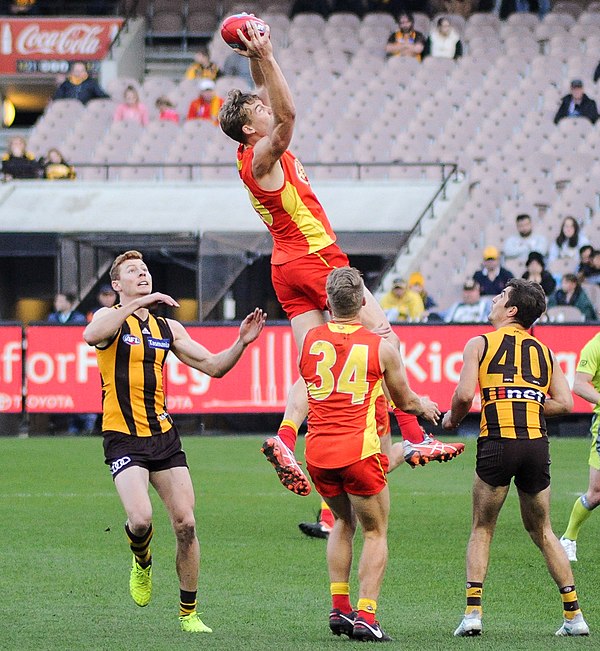 Lynch marks over his Hawthorn opponents in June 2017