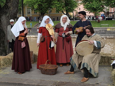 A Medieval band playing at the Turku Medieval Market, by the river.