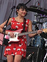 Norah Jones, singer and winner of multiple Grammy Awards NorahJones Parque Independencia 2010.jpg