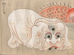 26 Nurikabe (ぬりかべ) is a Japanese yōkai. It is an inexplicable phenomenon that impedes a traveler's progress as if it were an invisible wall. Nurikabe means "painted wall" or "plastered wall."[68] Until Japanese scholars were introduced to the Bakemono no e scroll in 2007, it was thought that Nurikabe had not been illustrated before the modern era.[69][70] Folklorist Kunio Yanagita had recorded oral traditions concerning Nurikabe in Fukuoka prefecture on the island of Kyūshū and published his findings in 1933.[71] Shigeru Mizuki based his illustration of nurikabe in his famous manga series GeGeGe no Kitarō on Yanagita's description, and was surprised and pleased when he found out that nurikabe had indeed been illustrated in the Edo period.[72] Some Japanese scholars, however, contend that the nurikabe illustrated in Bakemono no e and the nurikabe of folklore in Kyūshū are not the same.[73][74] The Nurikabe in Bakemono no e resembles a white elephant without a trunk, or perhaps a white lion-dog, or komainu, with three eyes and black fangs.