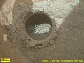PIA16761-MarsCuriosityRover-DrilledHole-20130206.jpg