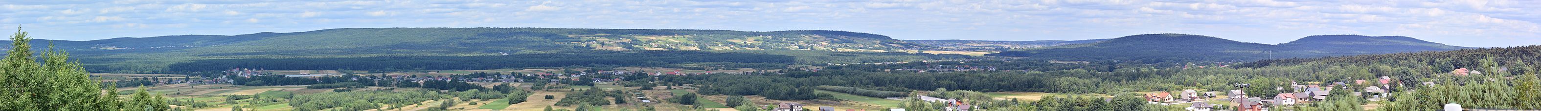 Panorama of Krajno-Zagórze village seen from hill in miniature park.