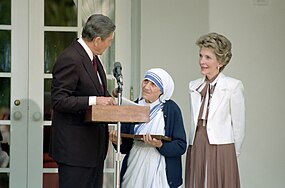 President Ronald Reagan presents Mother Teresa with the Medal of Freedom at a White House Ceremony in the Rose Garden.jpg
