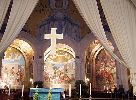 The sanctuary of the Basilica of Our Lady of the Rosary looking towards the Sorrowful Mysteries. Note the mosaic of Mary on top.