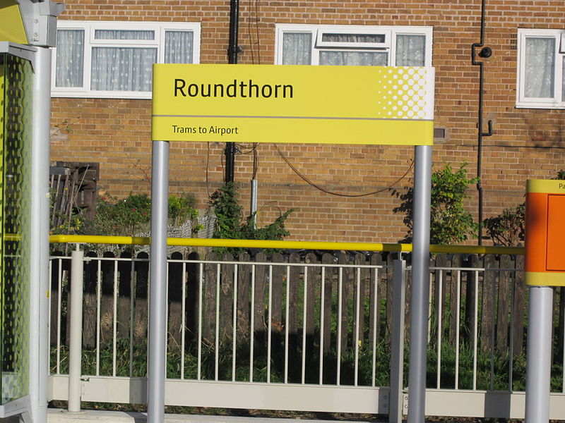 File:Roundthorn Metrolink station sign (1).jpg