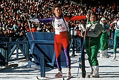 SPECIALIST Fourth Class (SPC) Curtis Schreiner, New York Army National Guard, watches for the starting signal to begin the biathlon competition, part of the 1988 Winter Olympics - DPLA - 11a5fe8ea0b4714e86bcab4bfde6c770.jpeg