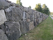 Skogskyrkogarden CementeryWall1.jpg