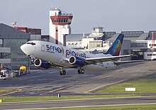 Small Planet Airlines Boeing 737-300 takes off from Vilnius Airport.jpg