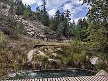 The Steamboat Spring, with history marker sign