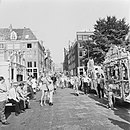 Draaiorgels aan de Amstel bij de Magere brug en het begin van de Nieuwe Kerkstraat