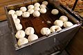 Day 014: Sufganiyot and Donuts in the deep-fryer at a bakery in Jerusalem