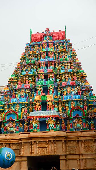 File:The colorful exteriors of a Hindu temple. Hindu architecture often uses a wide range of vibrant colors in the exteriors of religious buildings.jpg