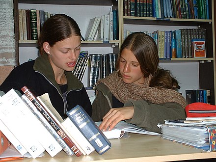 Women students engaged in chavrusa-style study at Midreshet Shilat in Israel