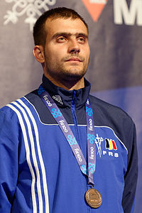 Tiberiu Dolniceanu podium 2013 Fencing WCH SMS-IN t205911.jpg