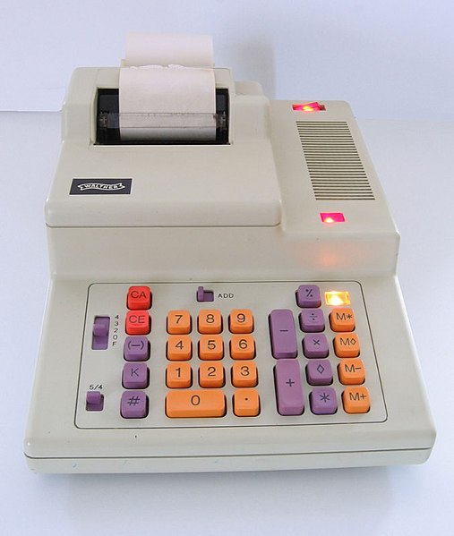 An office calculating machine with a paper printer