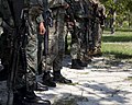 U.S. Marines and Ecuadorian naval infantrymen wait for instructions during cordon-and-search training as part of UNITAS-Partnership of the Americas 2012 at Camp Blanding, Fla., Sept 120905-M-IQ646-002.jpg