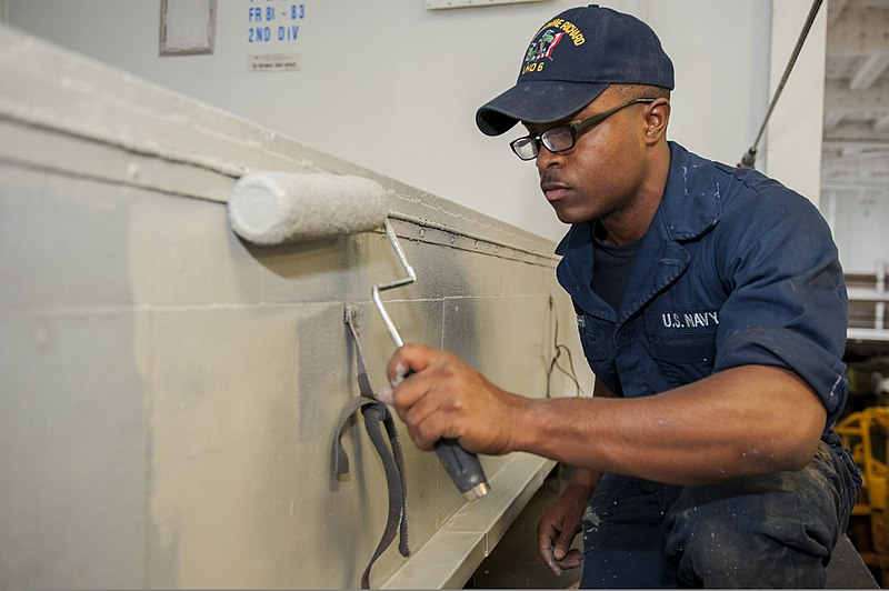 File:U.S. Navy Boatswain's Mate Seaman Keolis Stephens paints a storage locker aboard the amphibious assault ship USS Bonhomme Richard (LHD 6) in the Coral Sea July 29, 2013, during Talisman Saber 2013 130729-N-BJ178-007.jpg