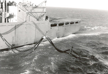 USS Camden refueling USS Chicago during the Vietnam War. UNREP Refuel probe.png