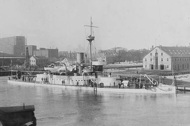 USS Amphitrite, lead ship of the Amphitrite class, at the Boston Navy Yard, 1890s