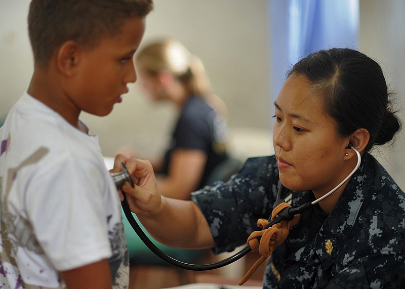 File:US Navy 100812-N-9964S-173 Lt. Amanda Higginson treats a Colombian child at the pediatric center in Colombia.jpg