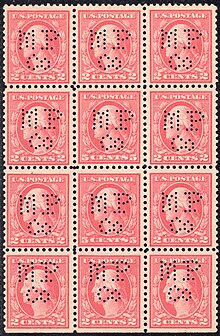 A large block of United States perfin stamps United States perfin stamps.jpg