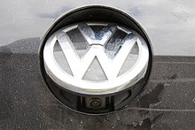 Backup camera on a Volkswagen Golf Mk7 hidden inside the logo VW Rearview camera.jpg