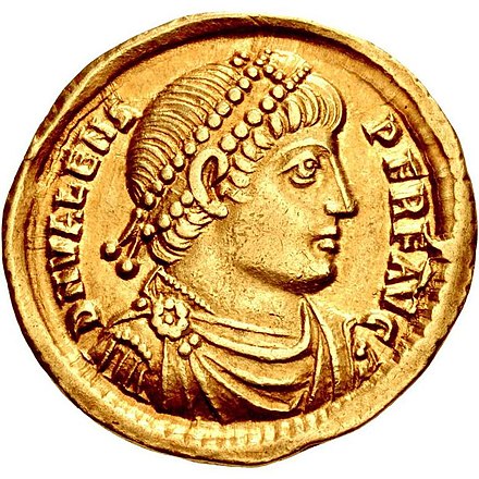 A solidus of Valens with a pearl diadem and a roseate fibula