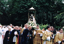 The statue of Our Lady of Walsingham in procession at the 2003 National Pilgrimage Walsinghamprocession.jpg