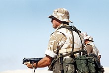 Queen's Dragoon Guards soldier wearing 1958 Web Equipment in the lead-up to the Gulf War; the Web Equipment saw its last major operational use in British service during this conflict Weapons training at Abu Hydra Range during Operation Desert Shield DM-ST-91-11992.jpg